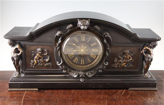 A Victorian bronze and black marble three piece clock garniture, of Renaissance revival form, urns 10.75in.